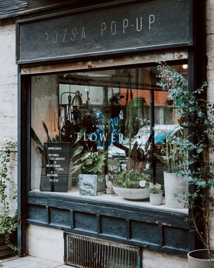 Retail store with crystal clear windows and a street view during the daytime.